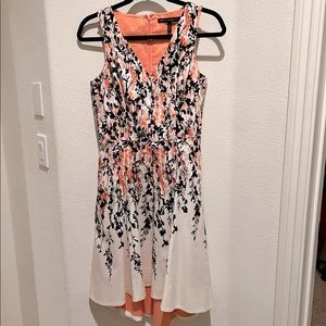 Lovely coral and white dress.